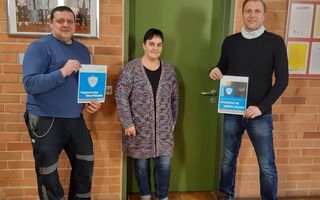Bild antimikrobiell, antibakteriell beschichteter Türgriffe mit SANPURE® an Schulen